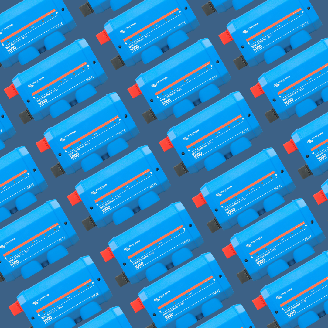Blue Victron Lynx Distributor 1000 units with red handles, ideal for campervan and off-grid solar power systems.
