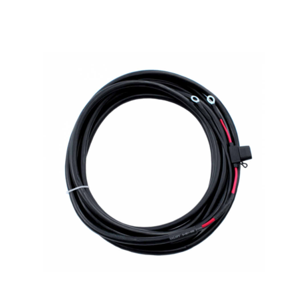 Coiled black solar cable with red tracer and MC4 connector for campervan or off-grid solar kits
